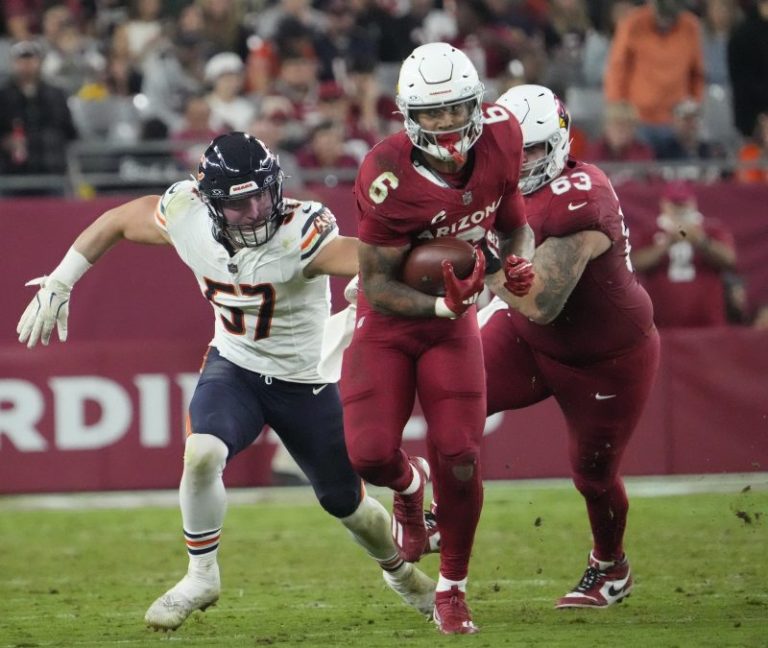 Cardinals ride running game to first place in NFC West