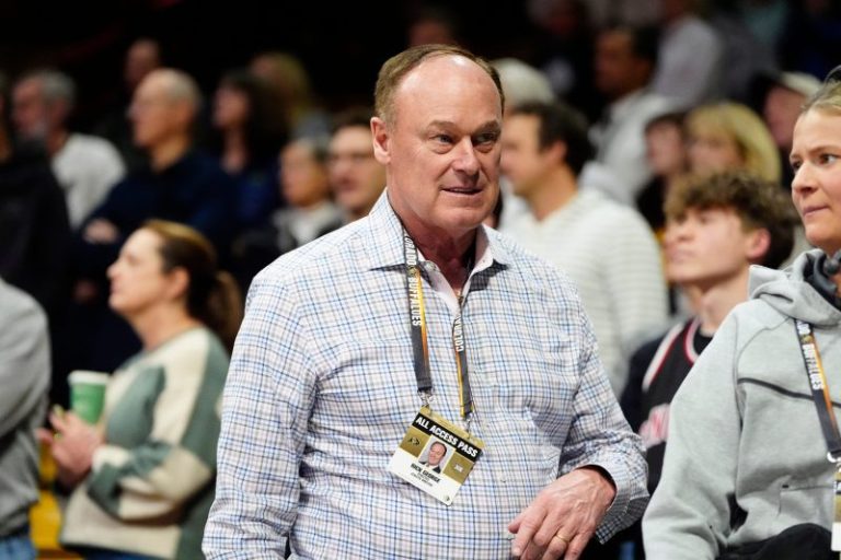 Colorado athletics director who hired Deion Sanders to step down next year